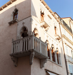 Venetian house. Corner balcony with a stone balustrade, Tartini Square, Piran - 731977959