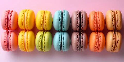 Muurstickers Colorful Macarons Arranged In Stripes On Pastel Backdrop With Room For Writing. Concept Garden Tea Party, Floral Table Decor, Vintage China, Whimsical Desserts, Springtime Refreshments © Ян Заболотний