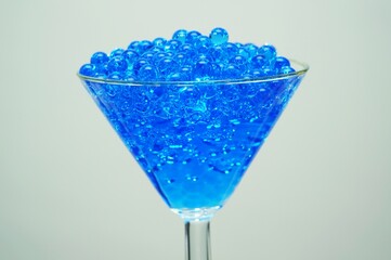glass of unreal blue cocktail drink. Strange futuristic drink.