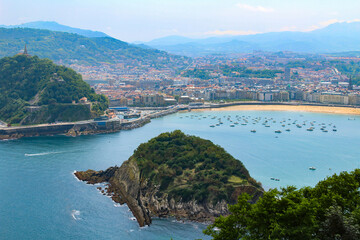 Panoramic view of  the city, ocean and sand beach on the summer day. San Sebastian. Spain.