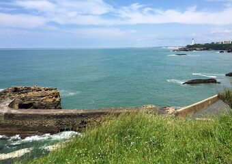 View of the ocean and lighthouse on the summer day. Biarritz. France.