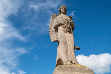 Fototapeta na wymiar angel over Miguel Mataro funerary monument, Llucmajor cemetery, Mallorca, Balearic Islands, Spain