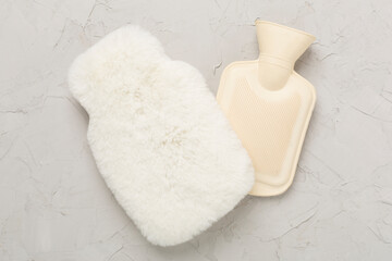 Rubber water warmer bag on concrete background, top view