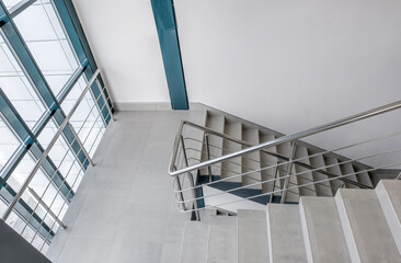 Fototapeta premium stairs emergency and evacuation exit stair in up ladder in a new office building