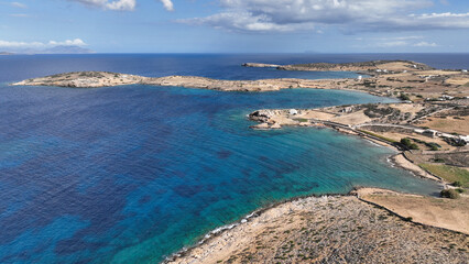 Fototapeta na wymiar Aerial drone photo of beautiful seascape in island of Shoinousa untouched. by tourism, Small Cyclades, Greece