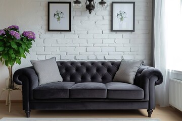 Stylish living room interior with comfortable dark sofa.