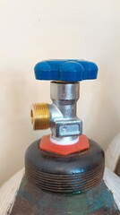 A new steel valve with a blue lamb on an acetylene cylinder