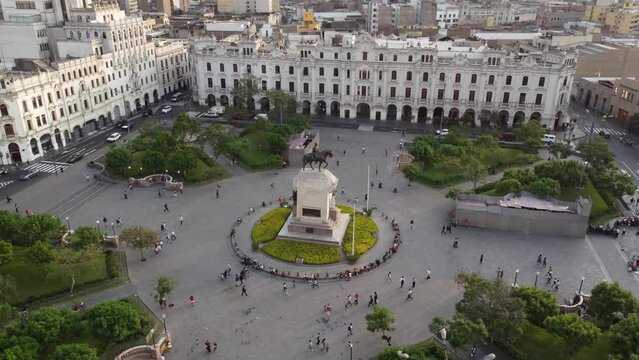 Aerial view of San Martin square with monument. Tourists and people gathered at Plaza San Martin in the historic center of Lima capital of Peru
