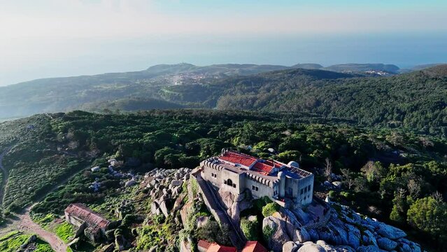 Drone circling Peninha Sanctuary on the top of the cliff at Sintra Cascais Natural Park, Portugal