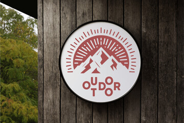 Red Vintage Mountain Outdoor Text badge in Circle White Signboard on the empty Wood Wall