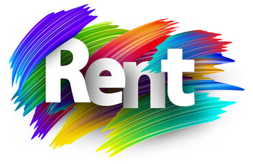 Rent paper word sign with colorful spectrum paint brush strokes over white.