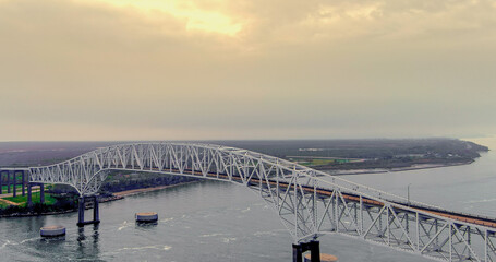 Aerial view of the Sabine Lake Causeway Bridge at Port Arthur Texas on an overcast day.