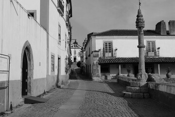 narrow street in the old village of Obidos in Portugal - 732022762