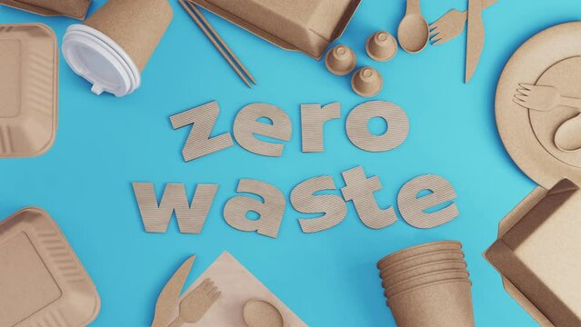 Cardboard eco-friendly food packaging and utensils arranged on a bright blue background with "zero waste" text, emphasizing sustainability.