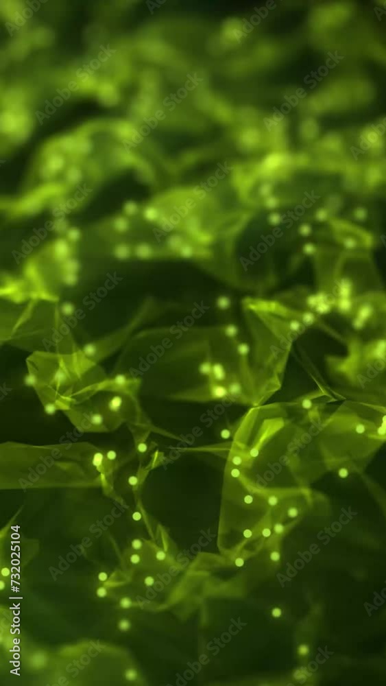 Wall mural green color abstract particle foam field waving smoothly like fluid. waving triangles particles moti