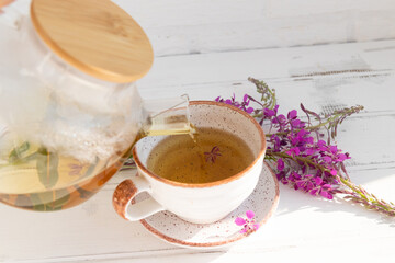 A drink (decoction) from the leaves and flowers of the medicinal plant ivan-tea (cypress,...