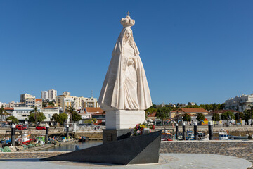Setubal, Portugal. 14 August 2023. Statue “Nossa Senhora do Rosário de Tróia” at the Port in...