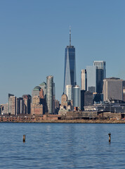 nyc downtown manhattan skyline with barge poles sticking out of the water in the foreground (world...