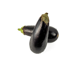 Eggplant on an orange background. Eggplant close-up.