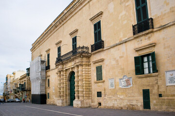 Fototapeta na wymiar Grandmaster's Palace decorated with carved stone in Valletta, Malta