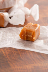 Hand Wrapped Soft Caramel Candies  on a Wood Butcher Block Table