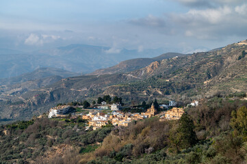 Fototapeta na wymiar Top view of Carataunas, a town in the Alpujarra of Granada, between mountains