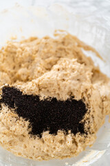 Lemon poppy seed muffins garnished with almond slivers