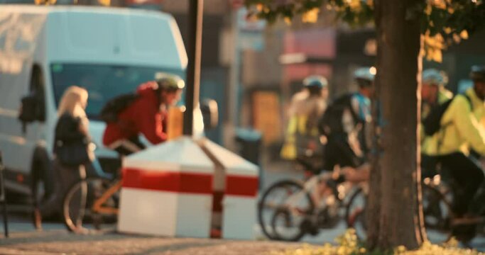 Street, city and people with bicycle for travel and transport, morning commute blur and population with carbon footprint. Pedestrian, traffic and cyclist on busy urban road for journey in London