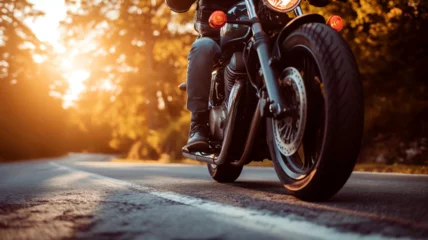 Fototapeten motorcycle sunset biker riding on the road © mr_marcom