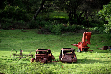  A Bunch Of Abandoned Vehicles  and hammer mill  On An Old Farm! in the Vredefort Dome area, North west, South Africa.  