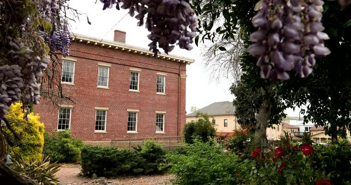 Daytime view of California's third capitol building, built in 1852, in historic downtown Benicia, CA, USA.
