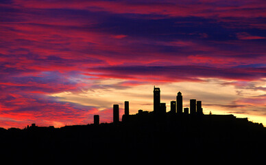towers of San Gimignano at sunset, Tuscany, Italy - obrazy, fototapety, plakaty