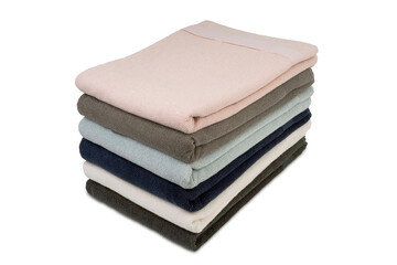 stack of new fresh bath towels isolated on white