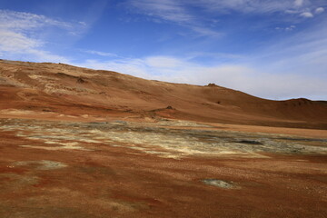 Hverarönd is a hydrothermal site in Iceland with hot springs, fumaroles, mud ponds and very active solfatares. It is located in the north of Iceland