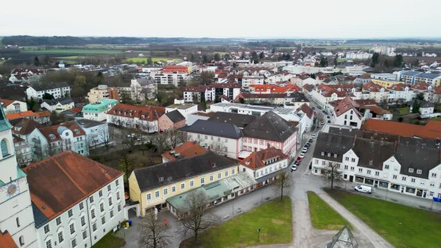 Right panning aerial shot of Altoetting over Kapellplatz-