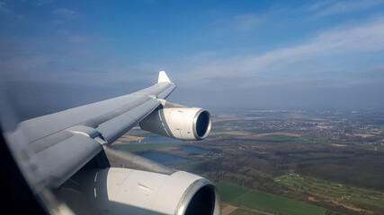 flight tehran to dusseldorf and view of around dusseldorf city from above during flight, window of...