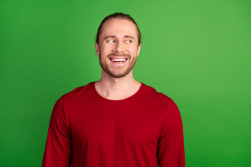 Portrait of funky guy with bristle long hairstyle wear red sweatshirt look at proposition empty...