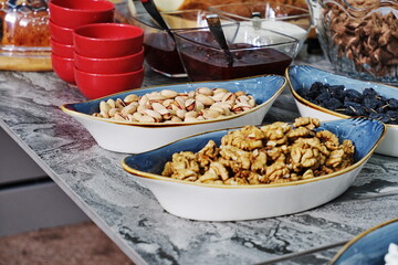 Various types of nuts on a plate.
