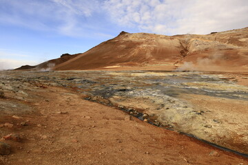 Hverarönd is a hydrothermal site in Iceland with hot springs, fumaroles, mud ponds and very active solfatares. It is located in the north of Iceland