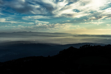 View from the top of the mountain with fog