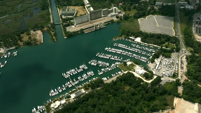Aerial shot of a marina and a solar farm in Monfalcone, Italy