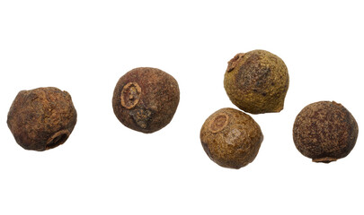 Dry allspice peas on isolated background, top view.