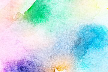 Macro close-up of an abstract colorful watercolor gradient fill background with watercolour stains. High resolution full frame textured paper background. Copy space.