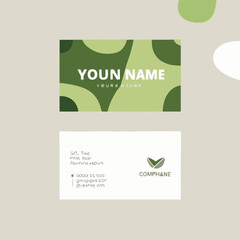 green and white business card 