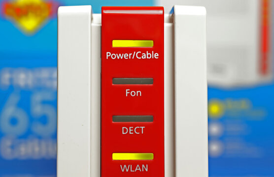 Viersen, Germany - January 9. 2024: Closeup of AVM Fritz box router for wireless and cable internet connection