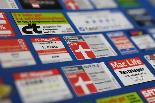 Viersen, Germany - January 9. 2024: Closeup of various test reports and ratings product comparison for purchase decision