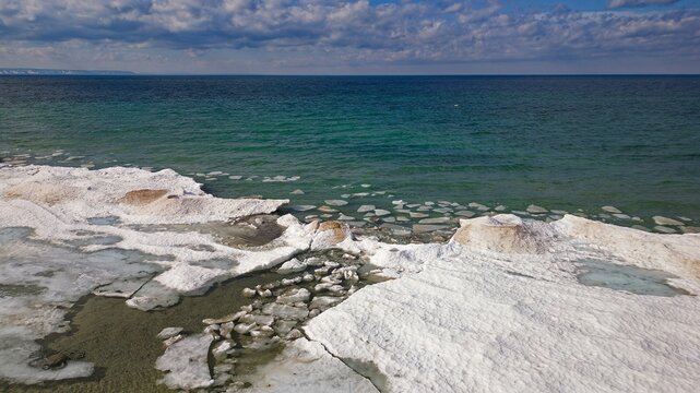 Drone shot of Georgian Bay Ice Pack Breaking Up and Melting in February when unseasonably warm