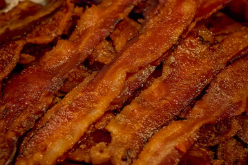 Fried bacon strips are pictured, July 9, 2011, in Columbus, Mississippi. Bacon is a type of salt-cured pork created from the meat of pigs. The most common form of bacon is side bacon, also known as