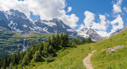 The Hineres Lauterbrunnental valley with the peaks Mittaghorn and Grosshorn and Breithorn and Holdrifall waterfall.