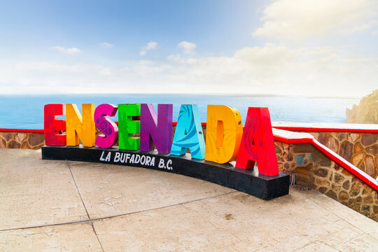 General view of the colorful Ensenada sign at the oceanfront La Bufadora blowhole, on the Punta Banda peninsula of Ensenada, Mexico on January 14 2023.	